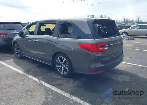 2021 Honda Odyssey Touring z USA, uszkodzony, nr VIN 5FNRL6H8XMB006701